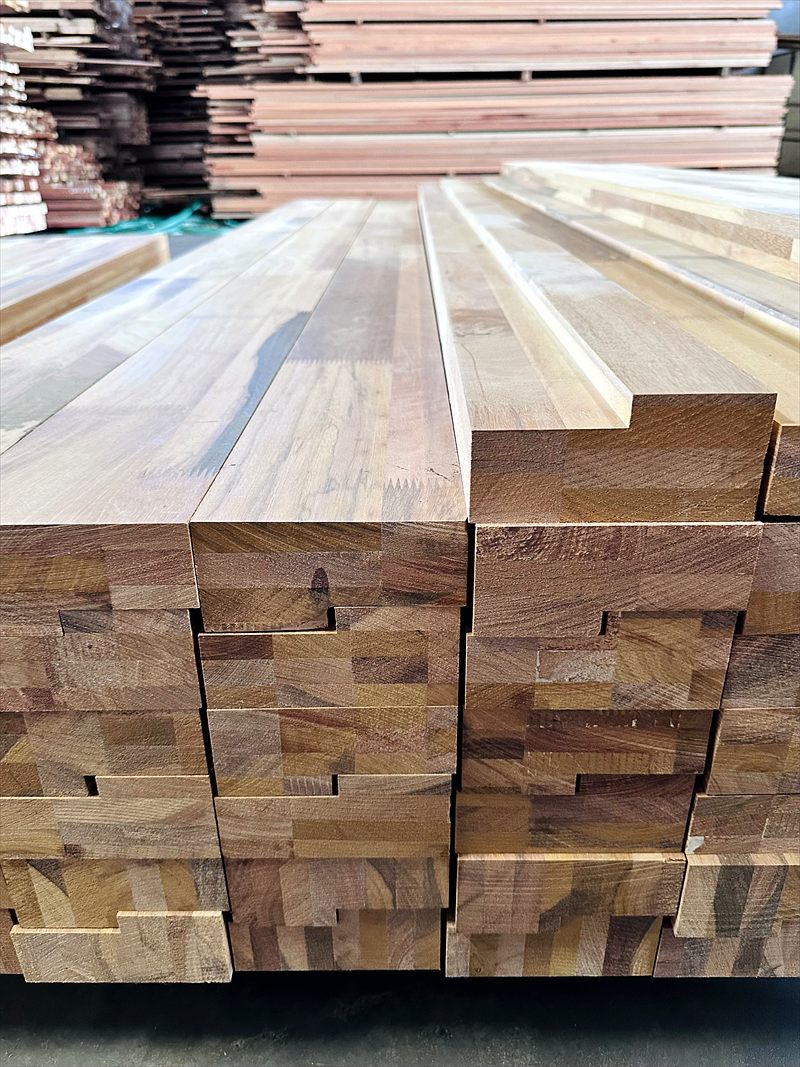 Finger-jointed lamination door frame sections stacked