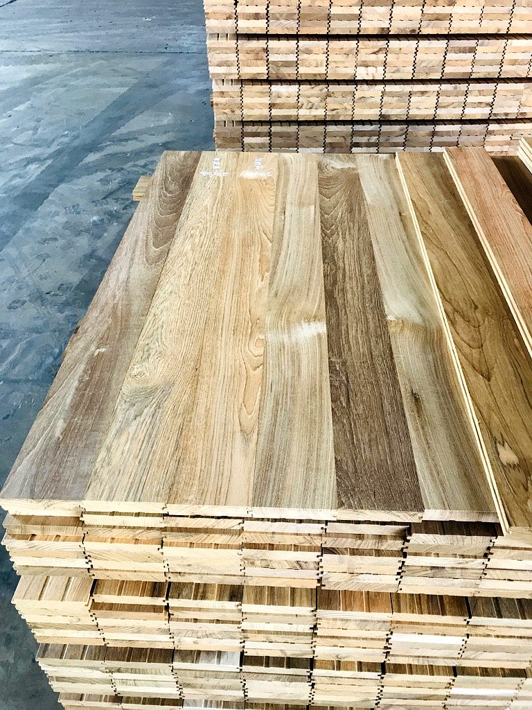 Tongue and groove flooring boards stacked at the mill