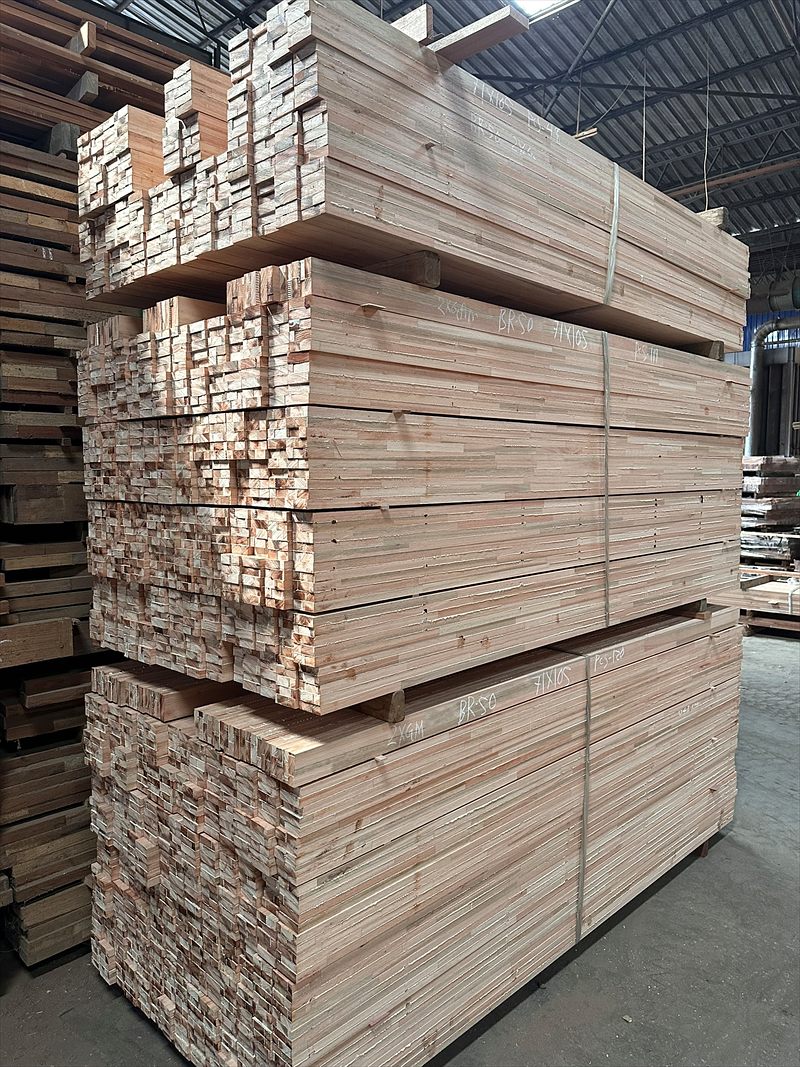 Yard stack of surfaced four-sided timber bundles